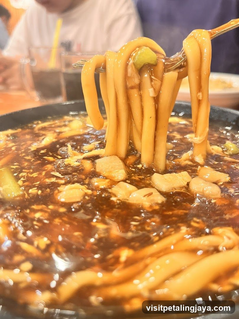 Spicy Noodle Dish with Fork Lift