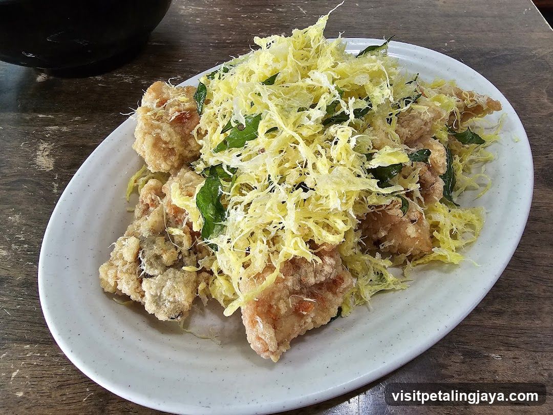 Fried Fish with Shredded Cheese Topping