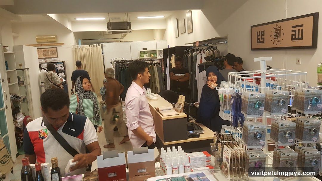 Interior of a retail store with customers and merchandise