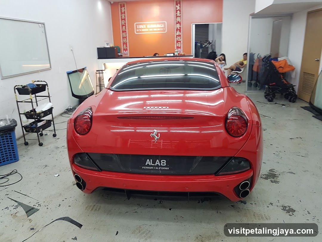 Red Ferrari in Workshop