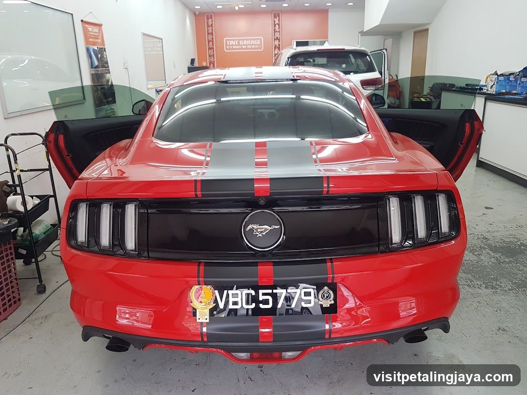 Red Mustang in Garage