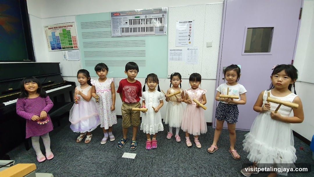 Children with Maracas in Classroom