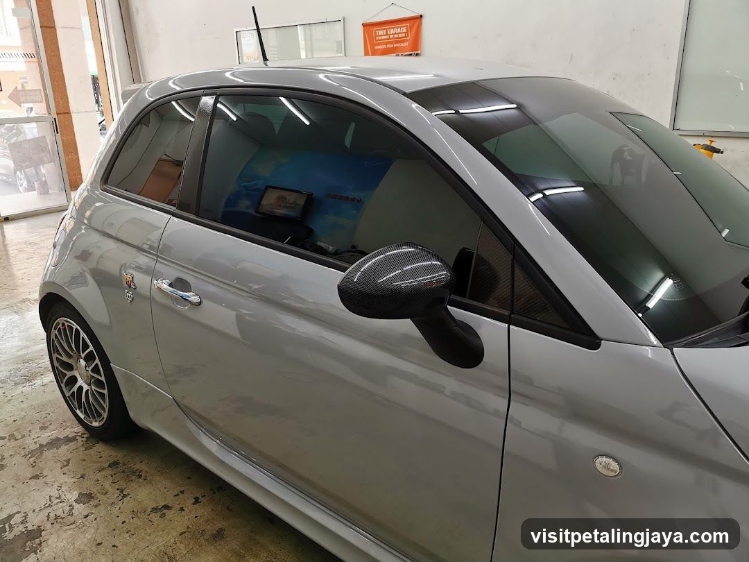 Silver Fiat 500 in Workshop
