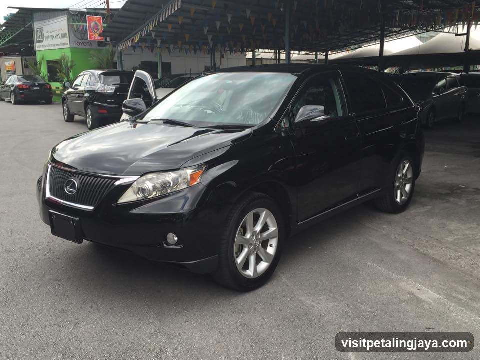 Black Lexus SUV in parking lot