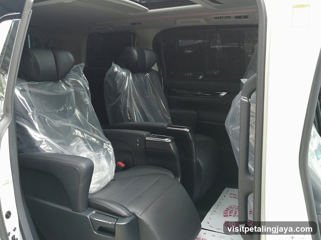 Interior of a new vehicle with protective covers on seats