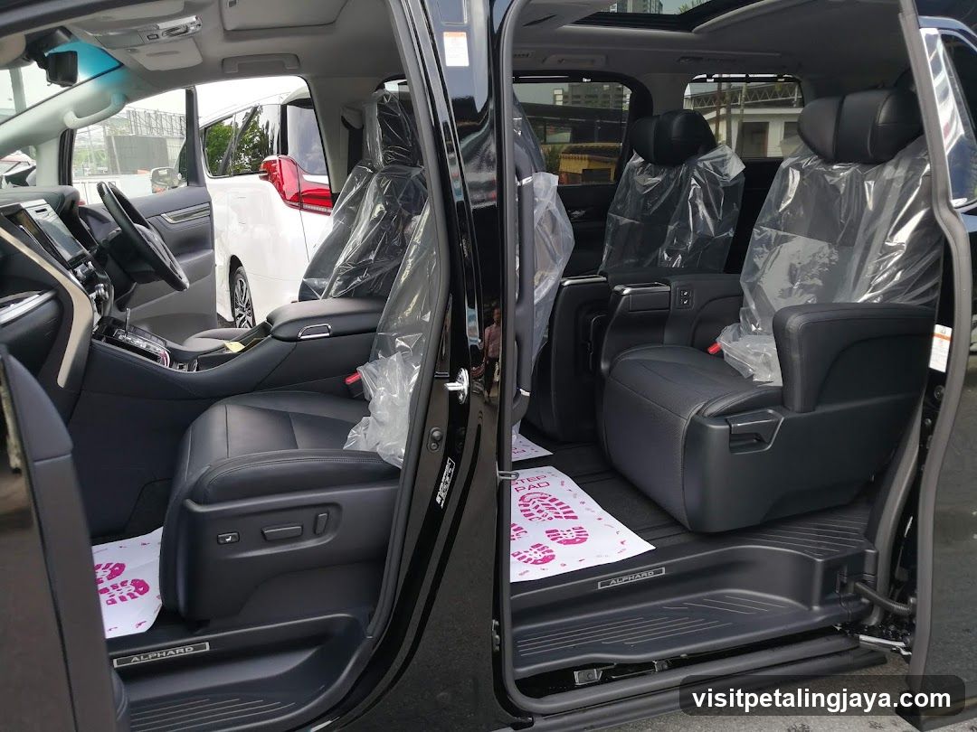 Interior of a new minivan with protective covers on seats
