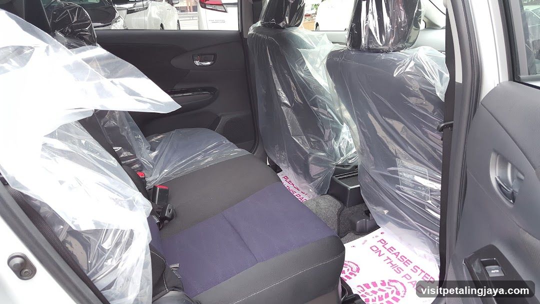 Car Interior with Protective Covering