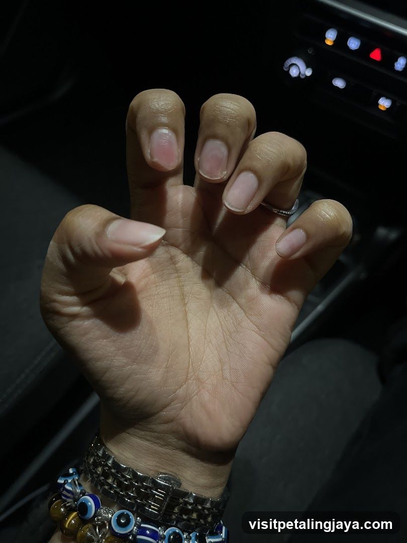 Hand in car interior