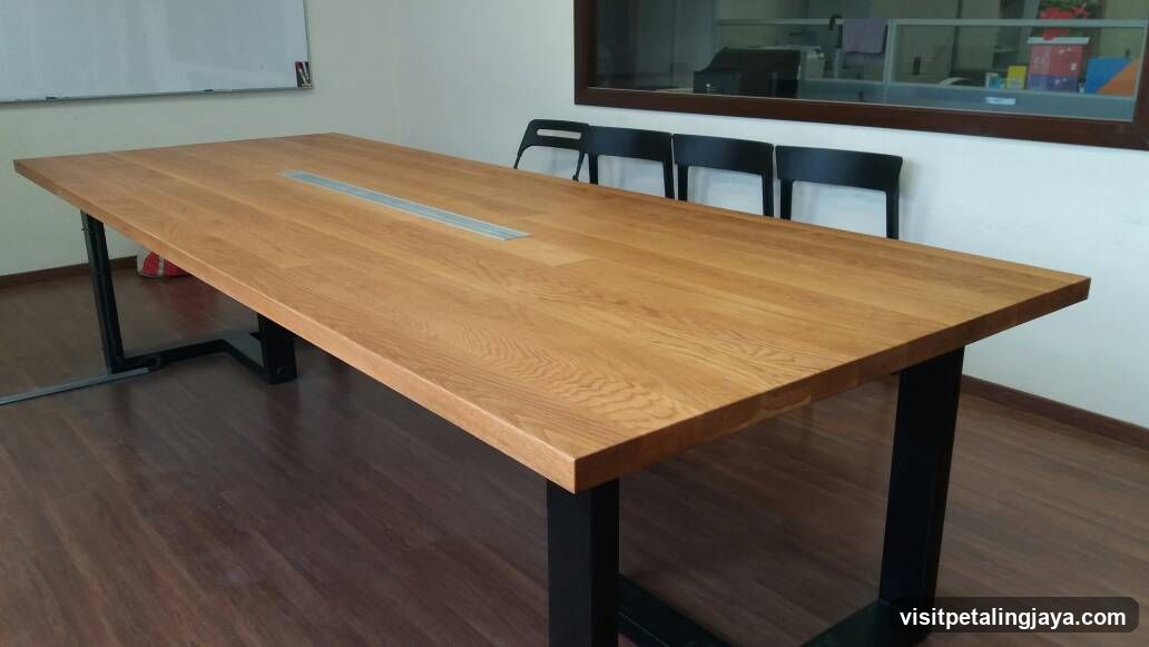 Wooden Conference Table in Office Setting