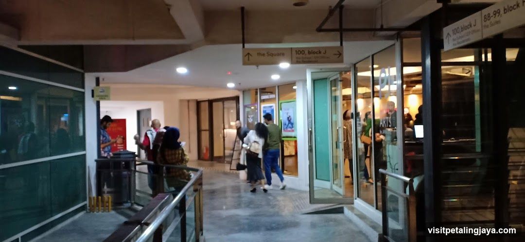 Corridor with people and signage