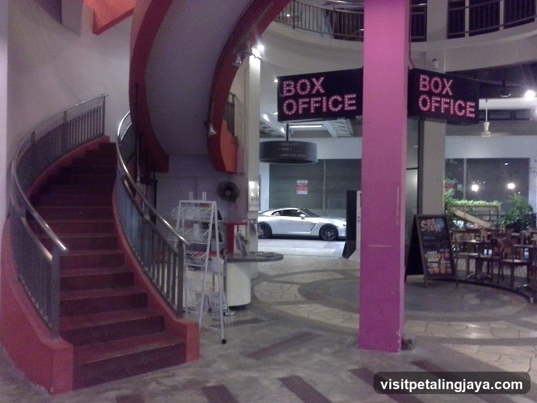 Interior Lobby with Staircase and Signage