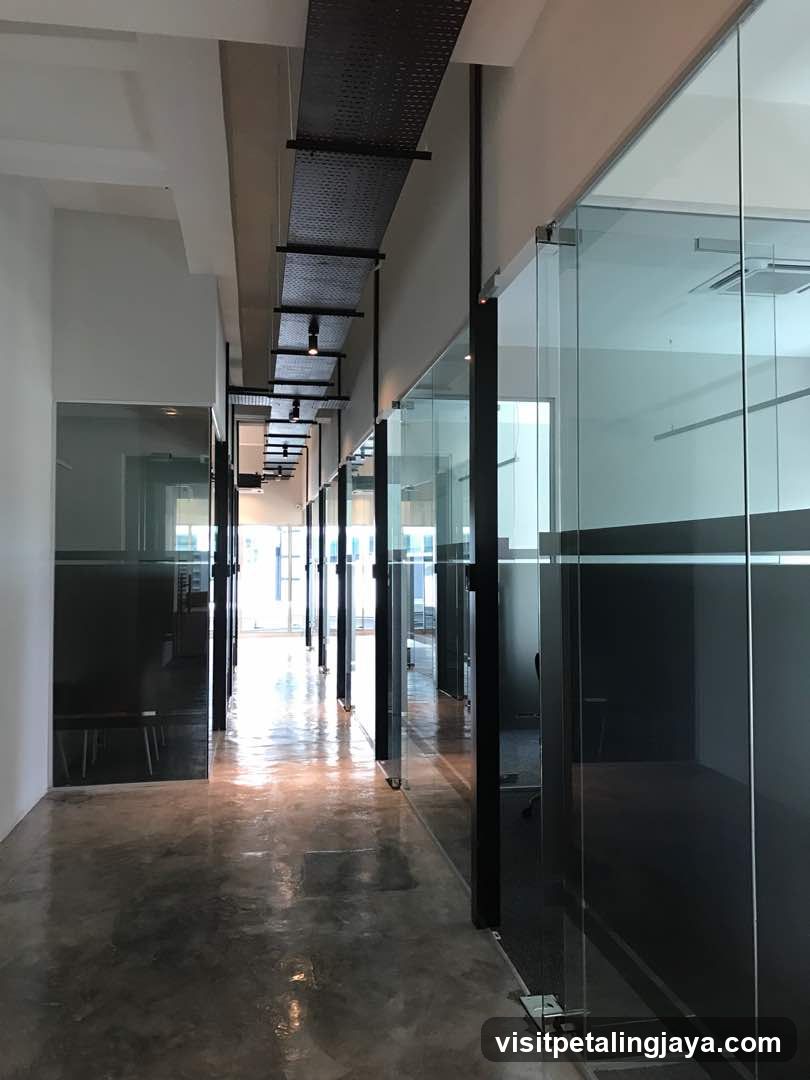 Modern Office Corridor with Glass Partitions
