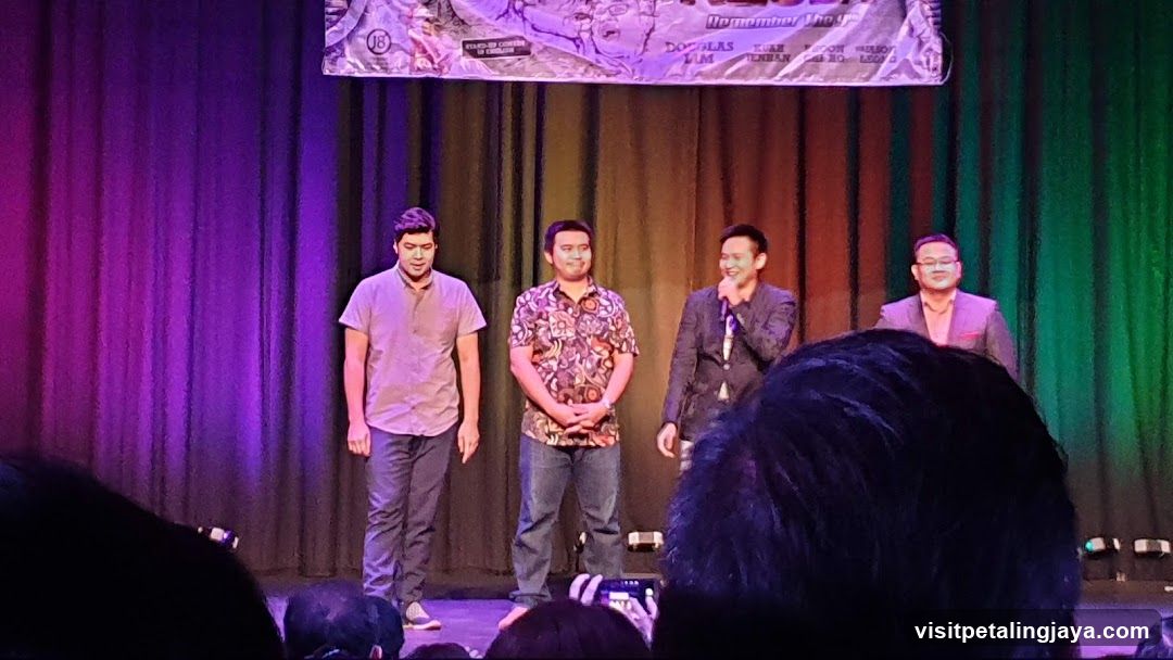 Stage Event with Four Men