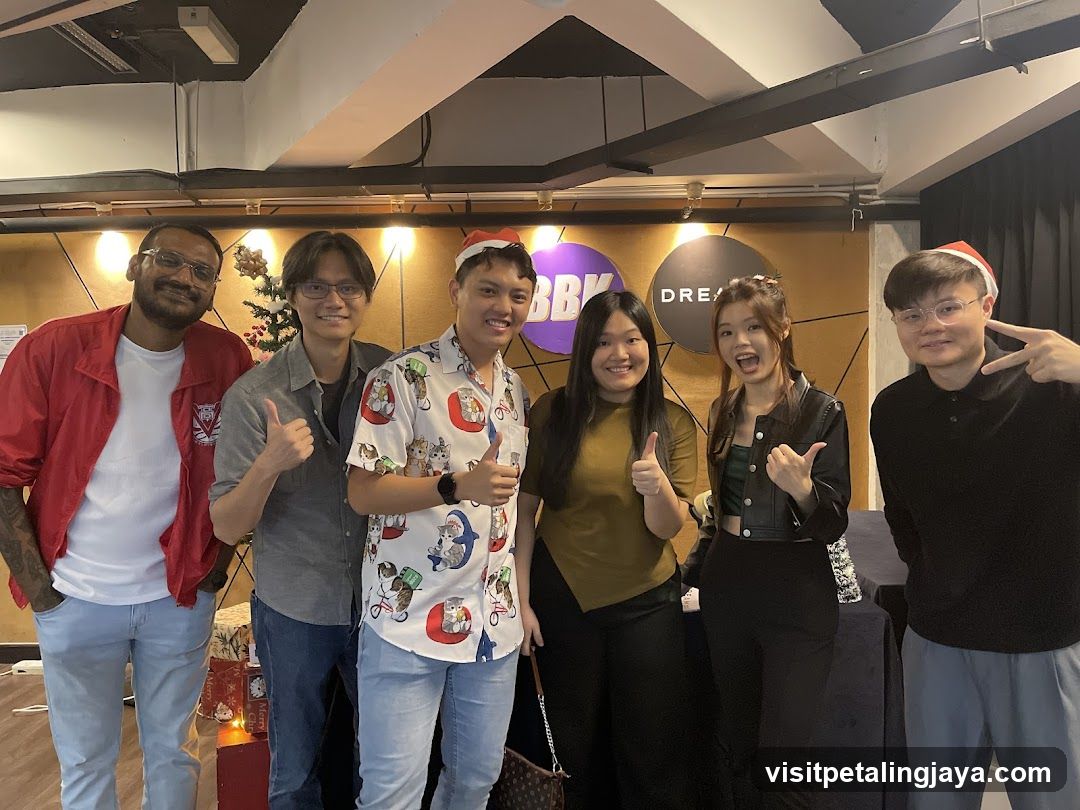 Group photo indoors with festive decorations