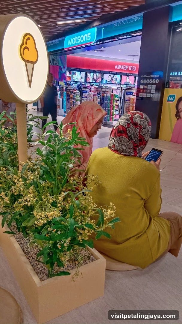 Shopping Mall Interior with Watsons Storefront