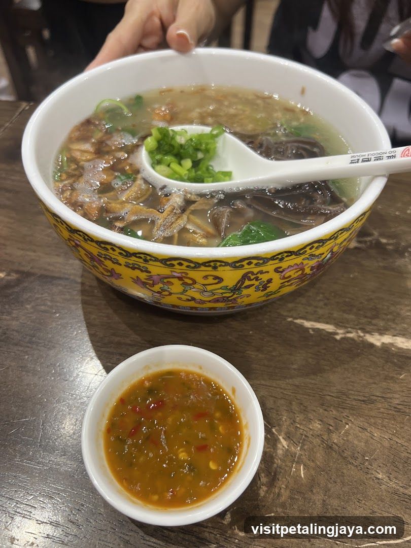 Bowl of Soup with Dipping Sauce