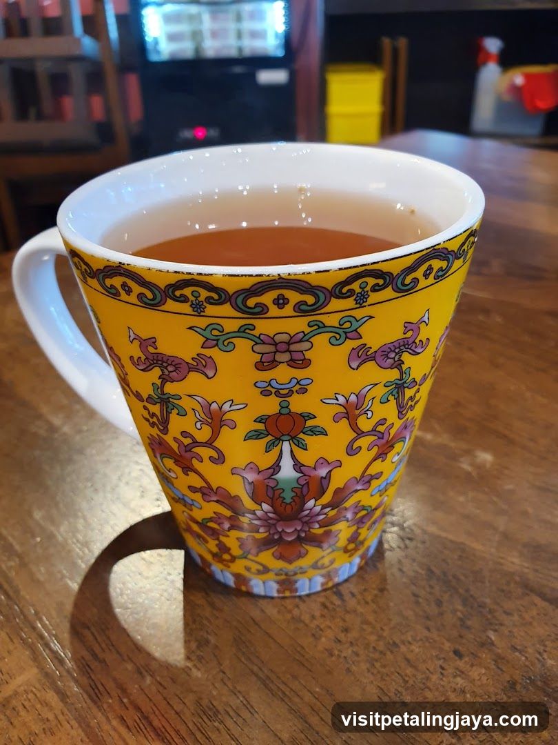 Yellow Patterned Cup of Tea