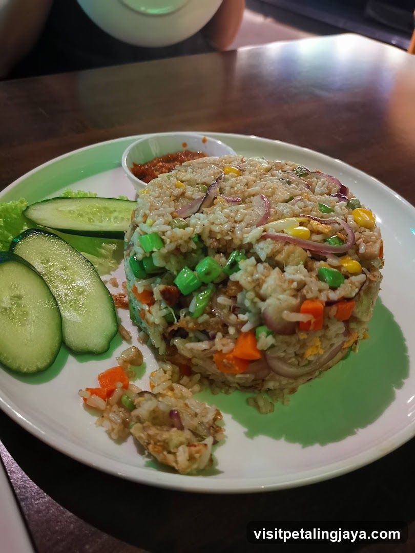 Fried Rice Dish with Cucumber Slices