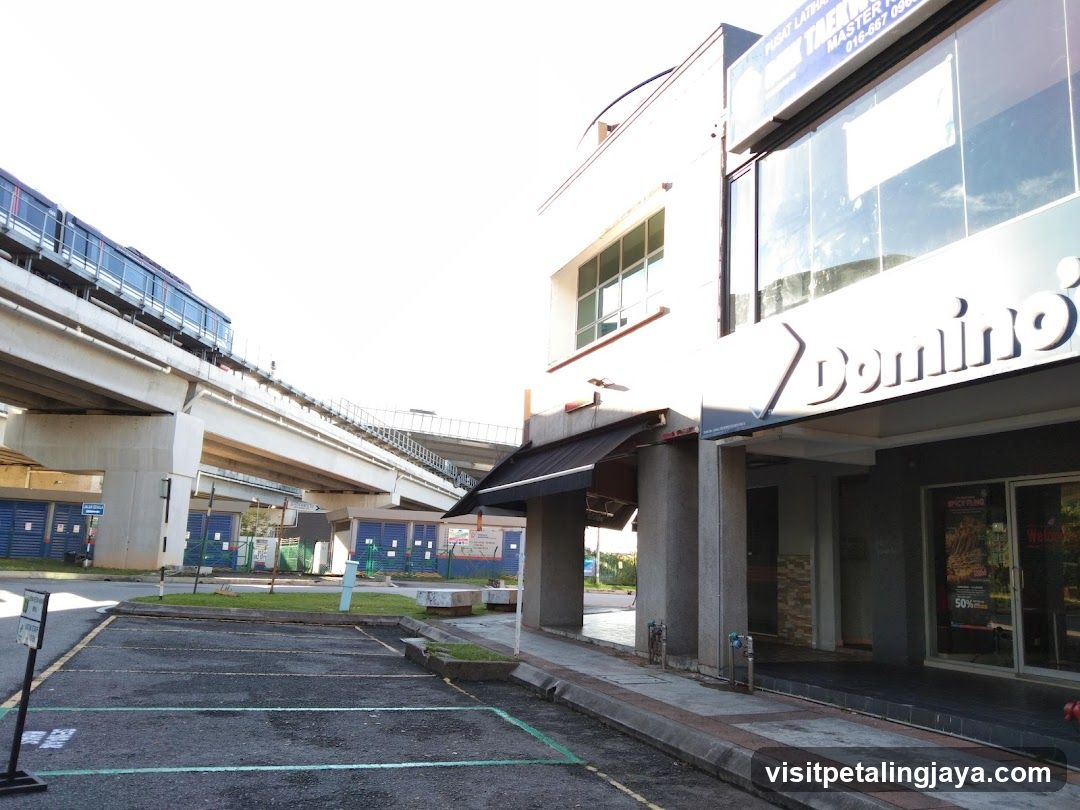 Domino's Shop Exterior with Elevated Train Track