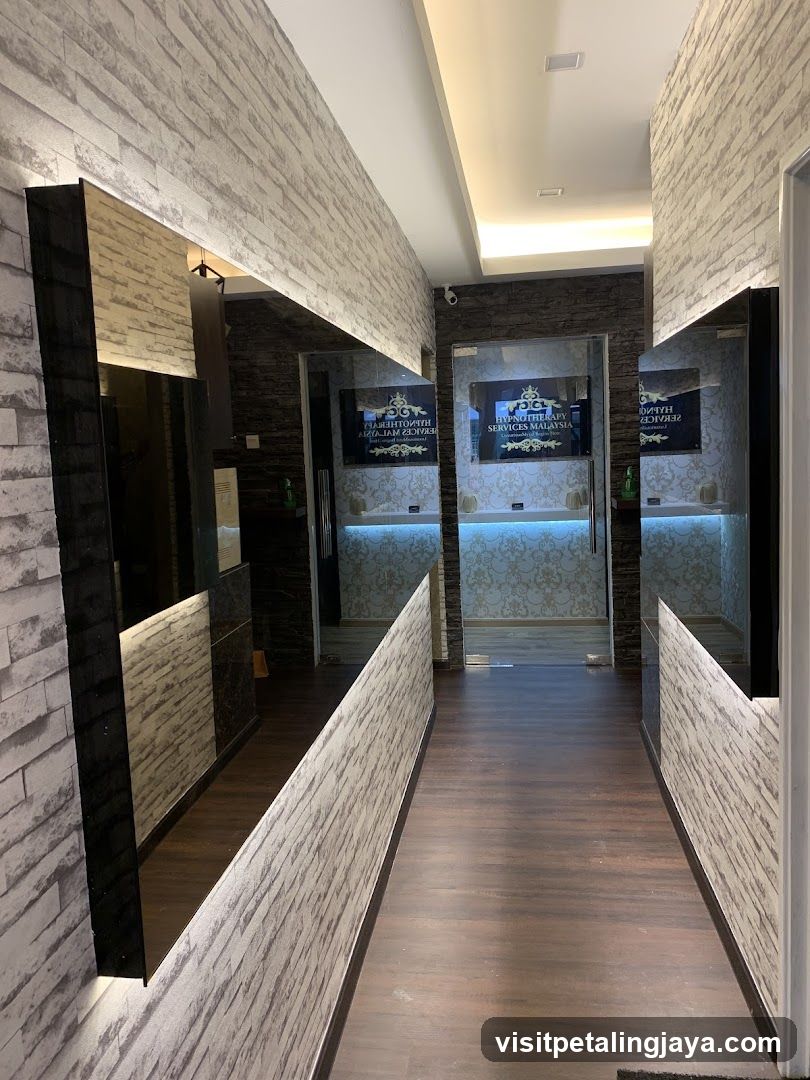 Interior hallway with mirrors and screens