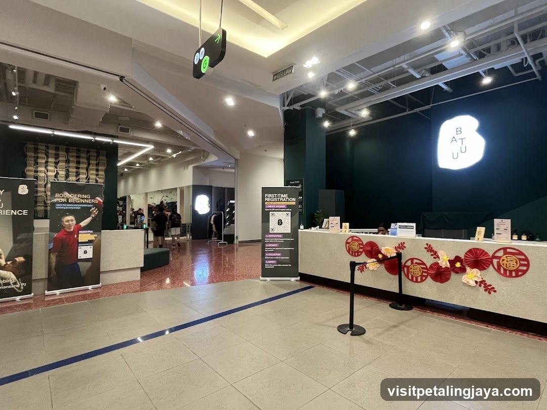 Interior of a modern commercial space with reception desk and promotional displays