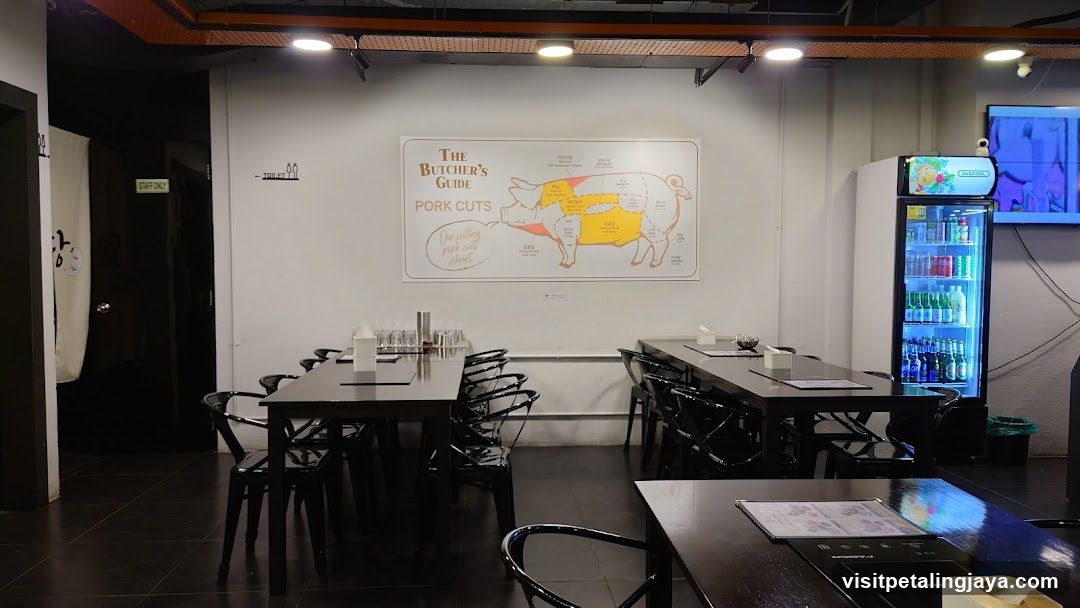 Restaurant Interior with Pork Cut Chart