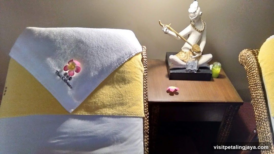 Spa Room Interior with Thai Statue