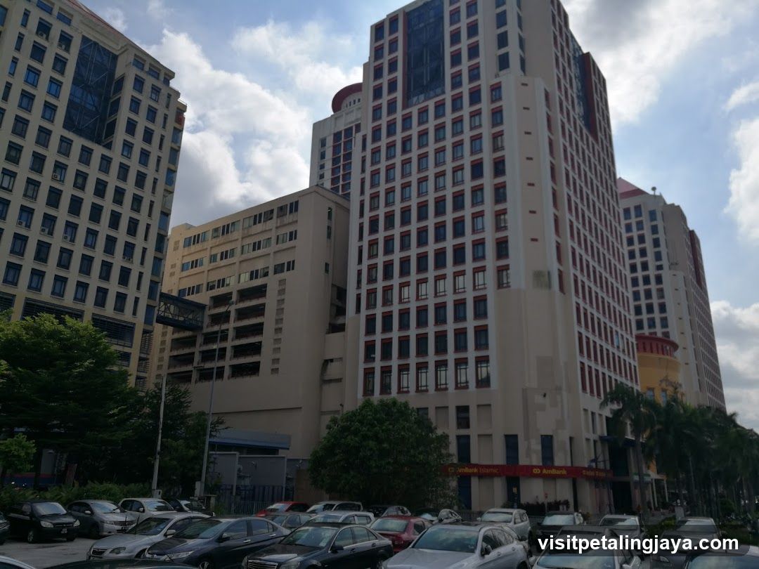 Urban Building Exterior with Parking Lot