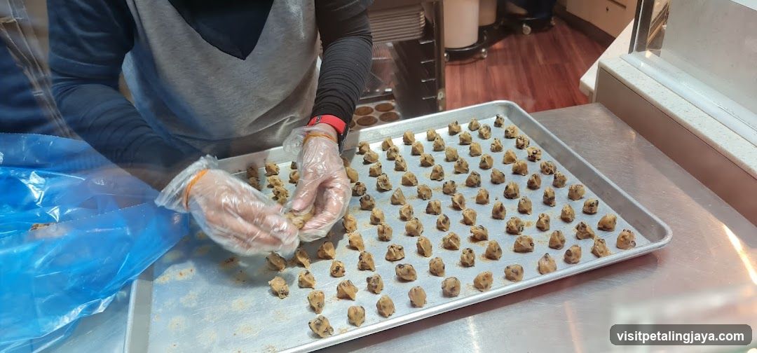 Baker Preparing Cookies
