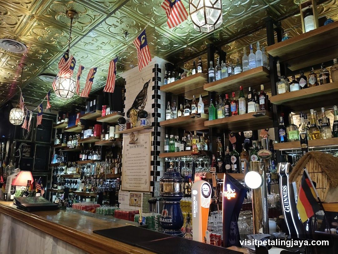 Bar Interior with Malaysian Flags and Beer Taps