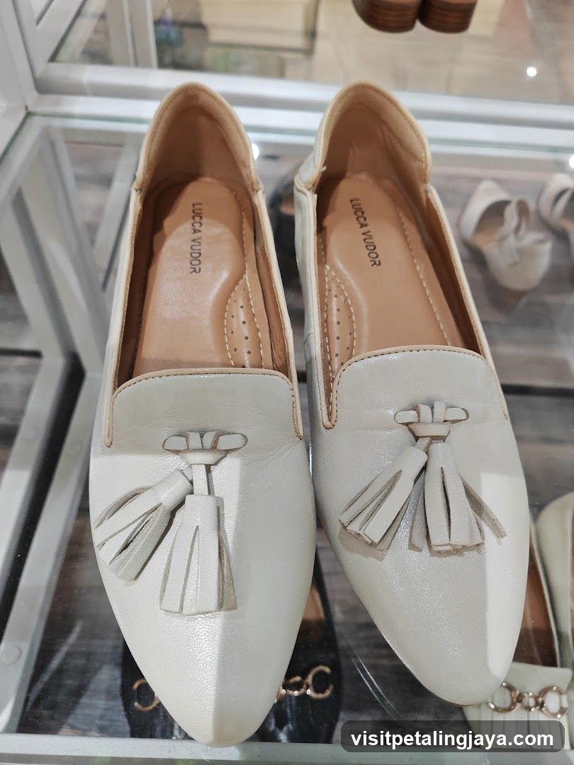 White Tassel Loafers Display