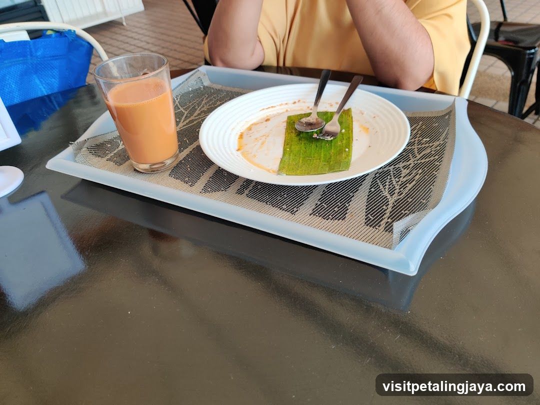Breakfast Tray with Juice and Banana Leaf Food