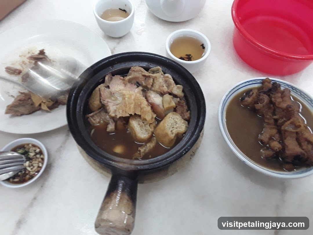 Clay Pot Meat Dish with Side Dishes