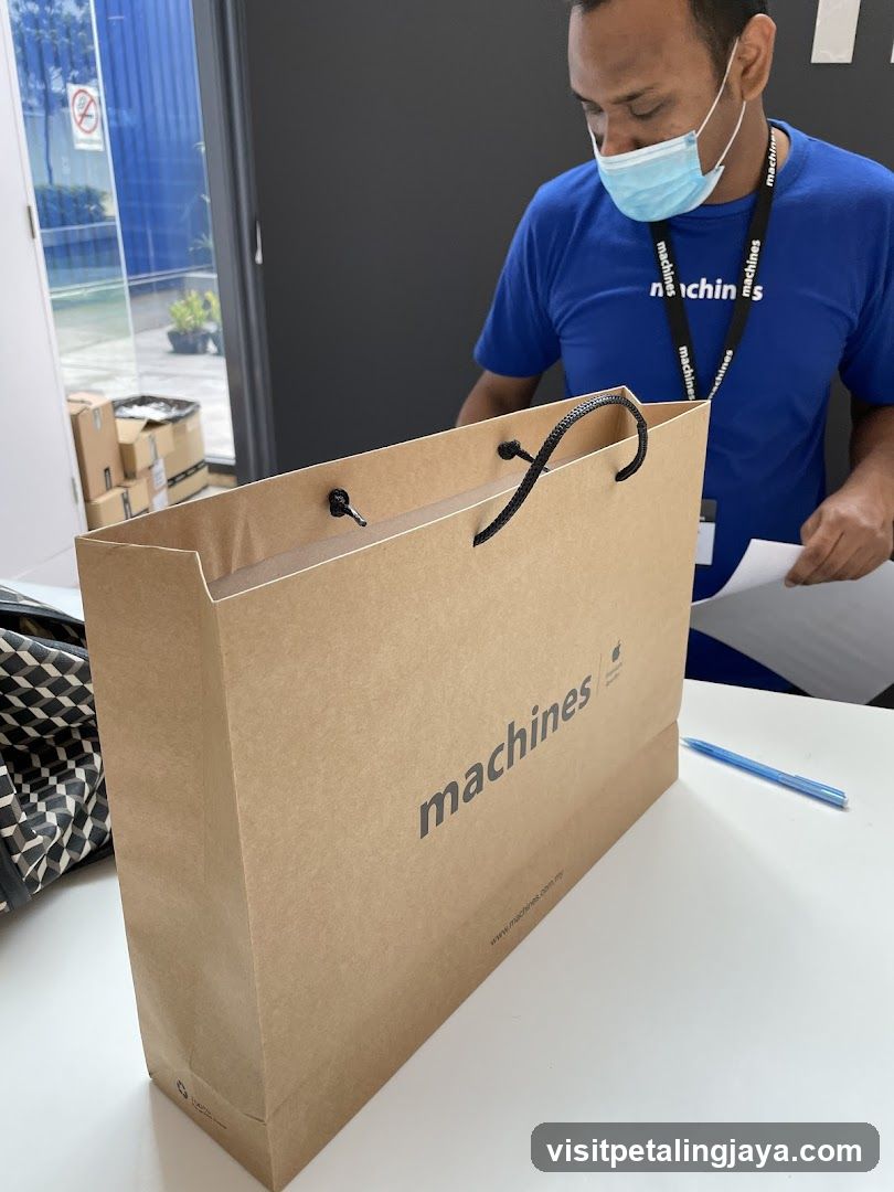 Staff with branded shopping bag