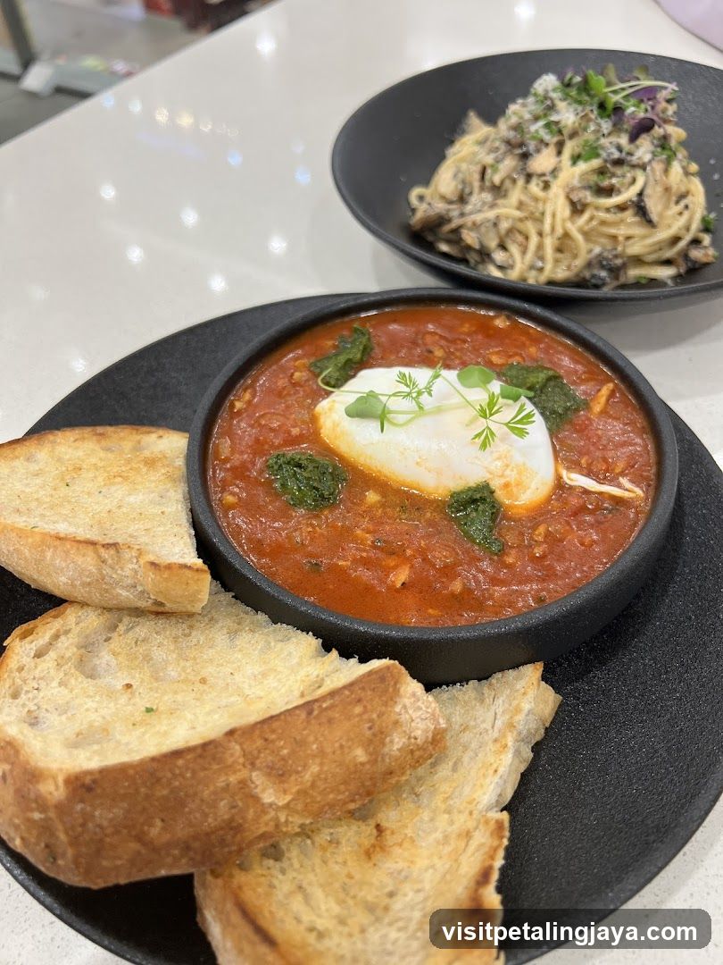 Bowl of Tomato Soup with Poached Egg and Toast