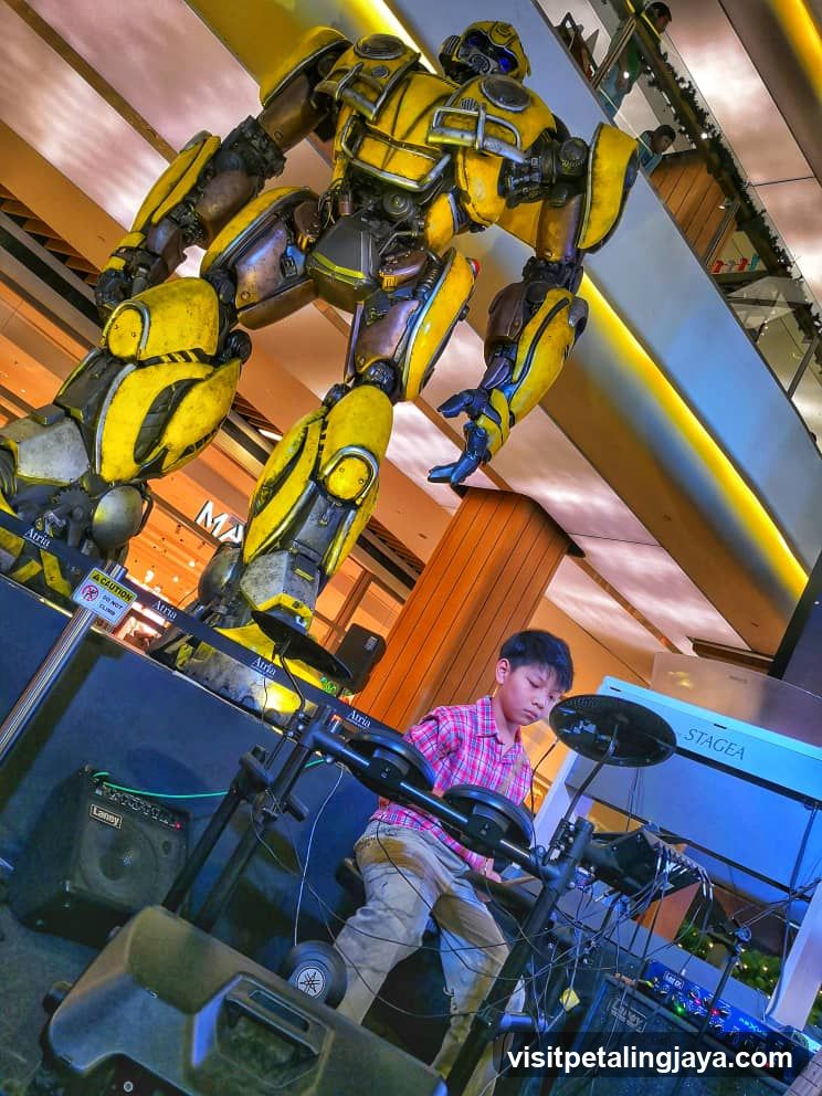 Bumblebee Robot and Drummer in Mall