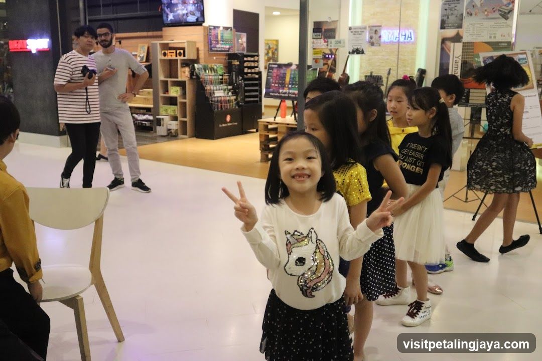 Children's Group Activity in Mall Interior