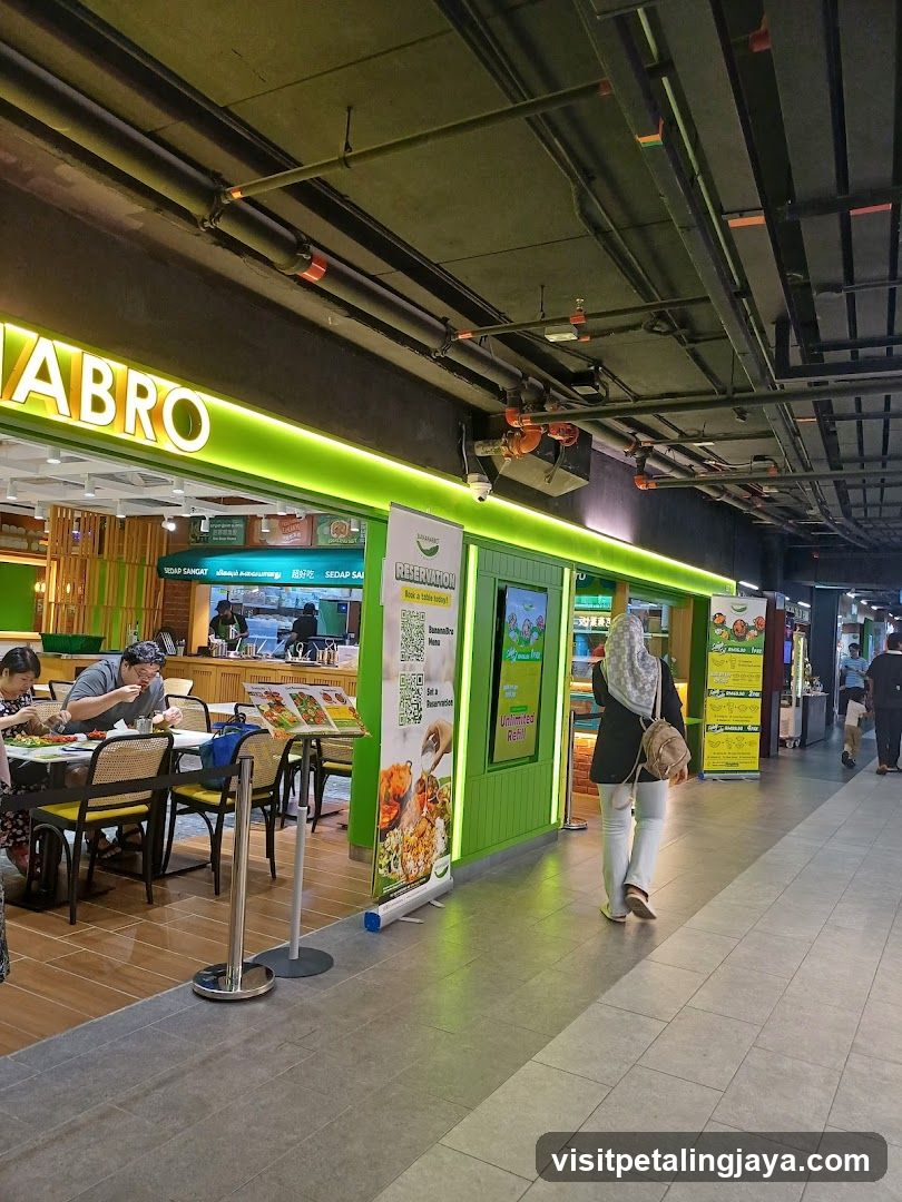 Food Court Interior with Green-Themed Restaurant