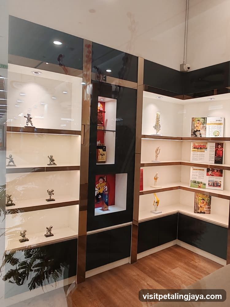 Display Cabinet with Statues and Posters