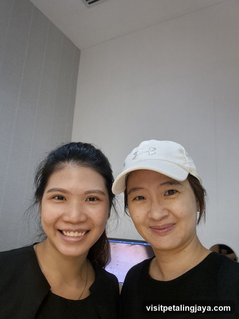Two women smiling indoors