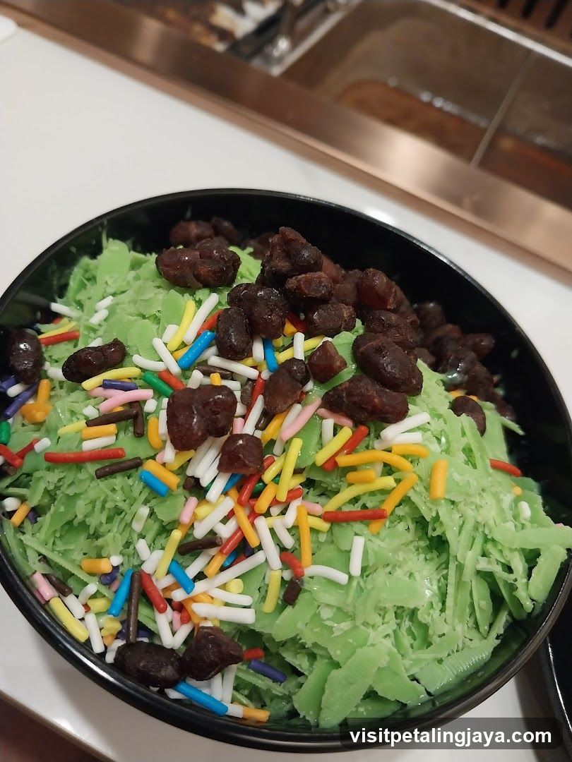 Green Dessert with Sprinkles and Raisins