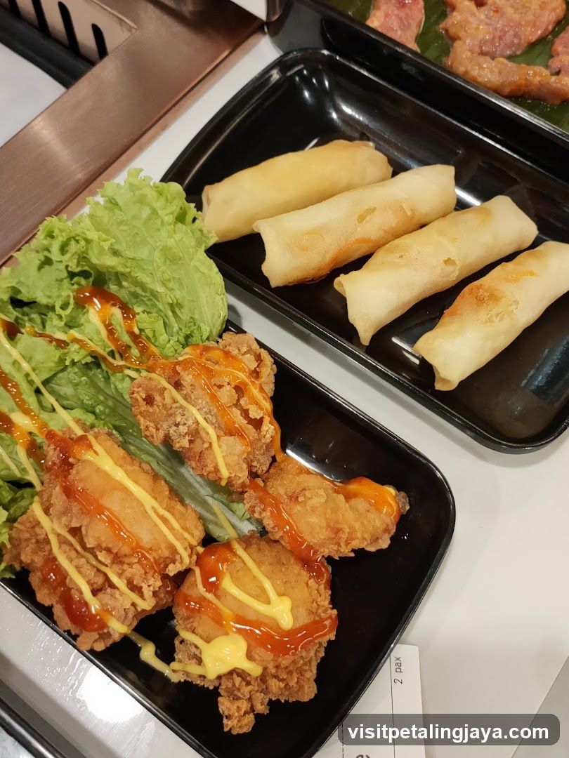 Fried Chicken and Spring Rolls with Sauces