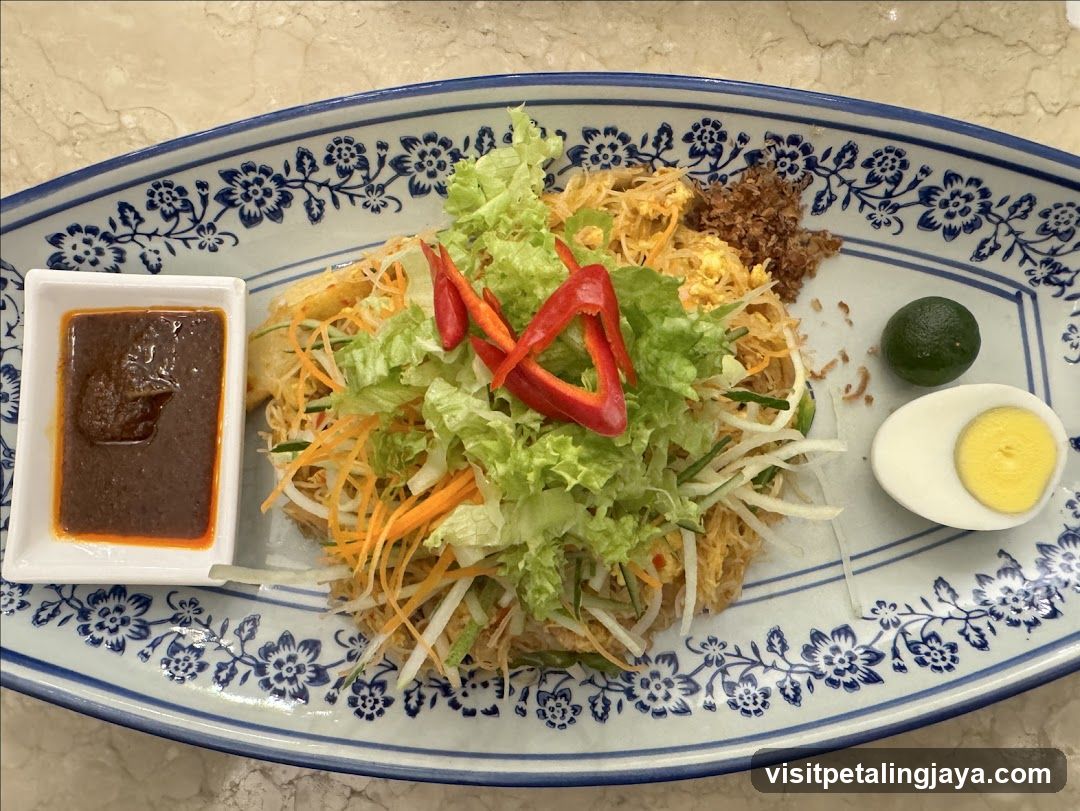 Noodle Dish with Sauce and Garnishes