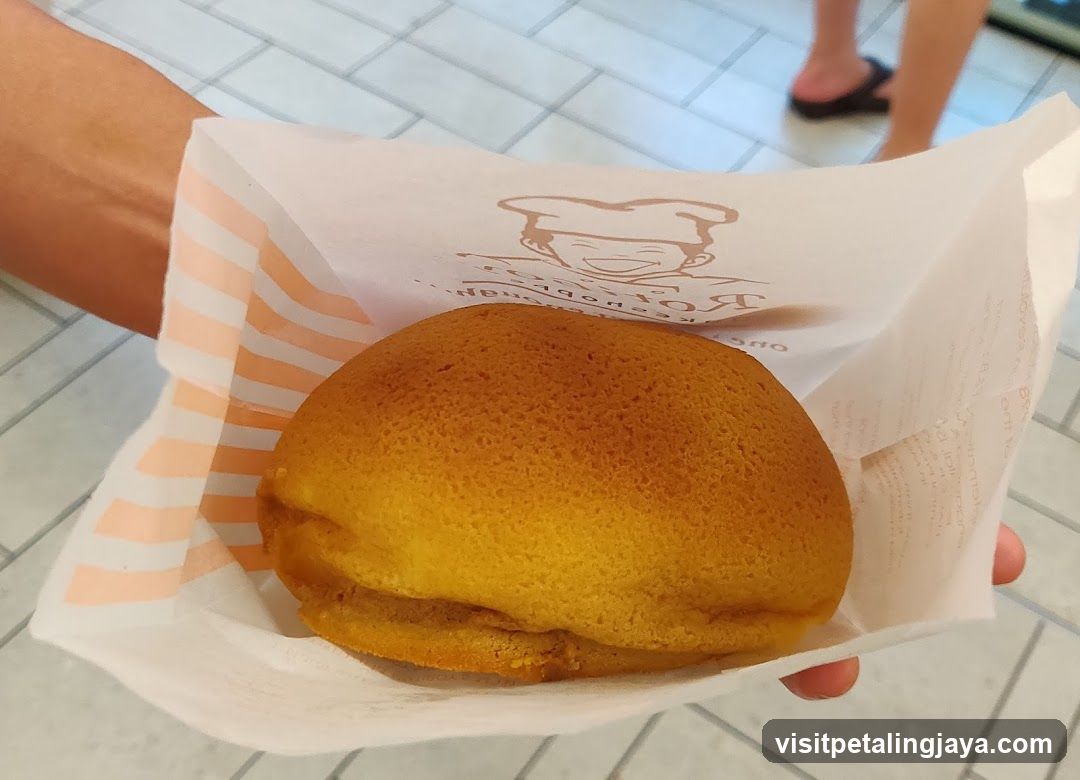 Handheld Bun in Paper Wrapper