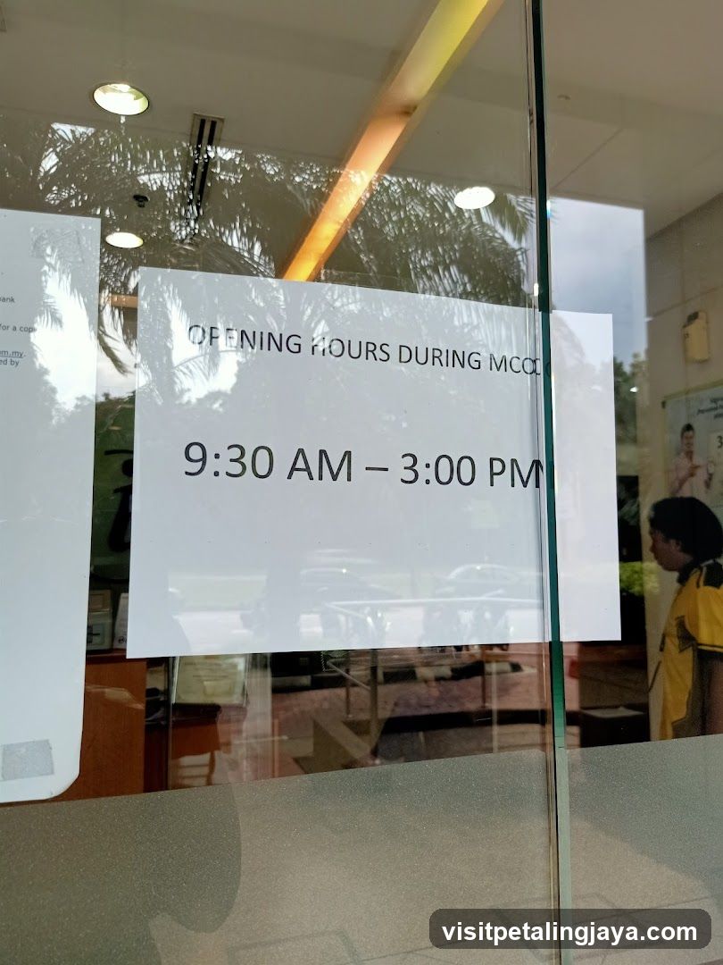 Opening Hours Sign on Glass Door
