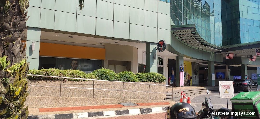 Modern Building Entrance with Shop Signage