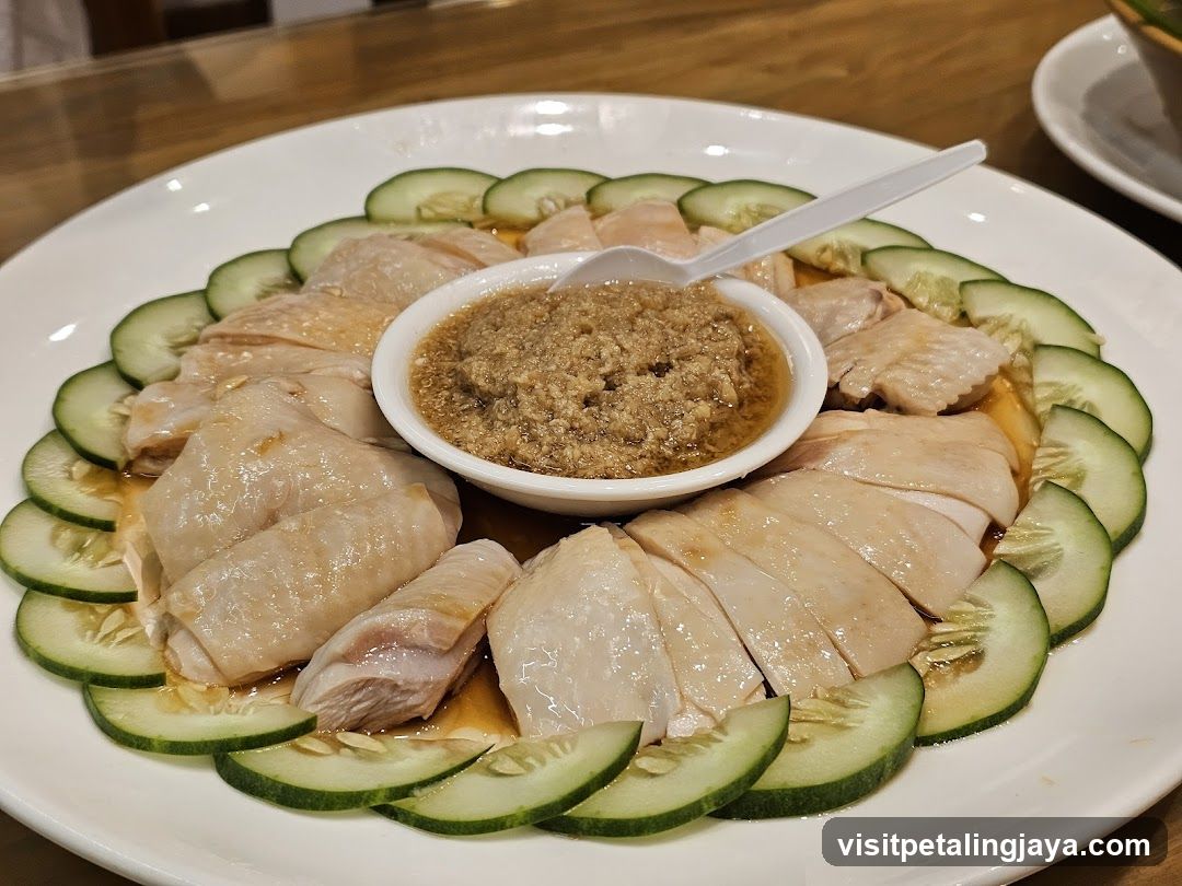 Hainanese Chicken Rice with Cucumber and Sauce