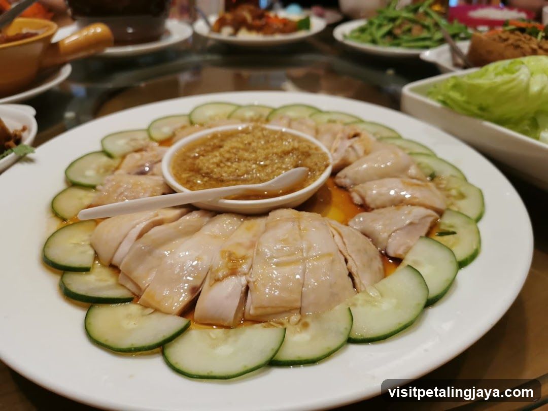 Hainanese Chicken Rice with Cucumber and Sauce