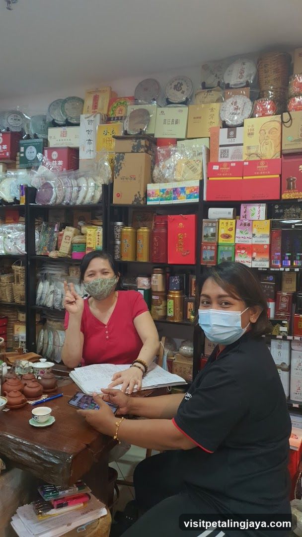 Tea Shop Interior with Staff