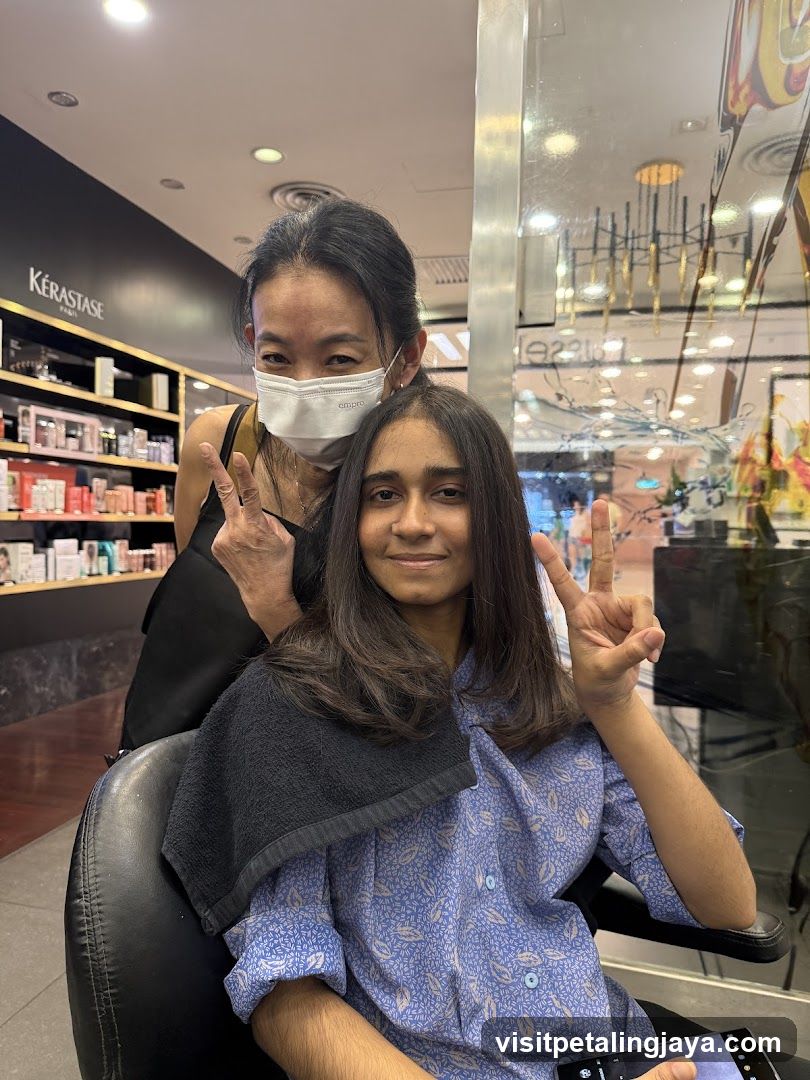Hair Salon Interior with Staff and Customer
